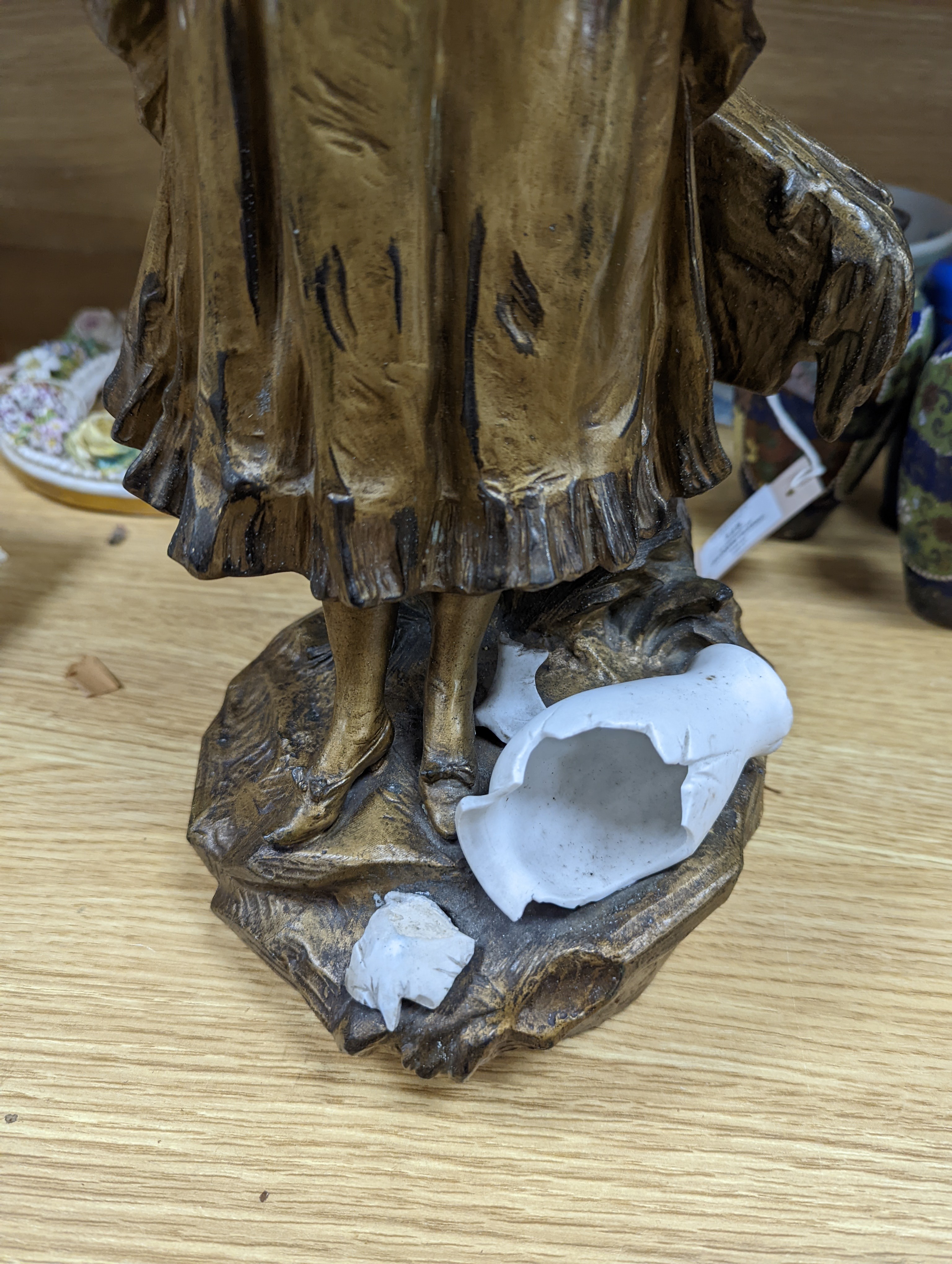 A late 19th Century French gilt spelter and bisque porcelain figure after Mednat 54cm